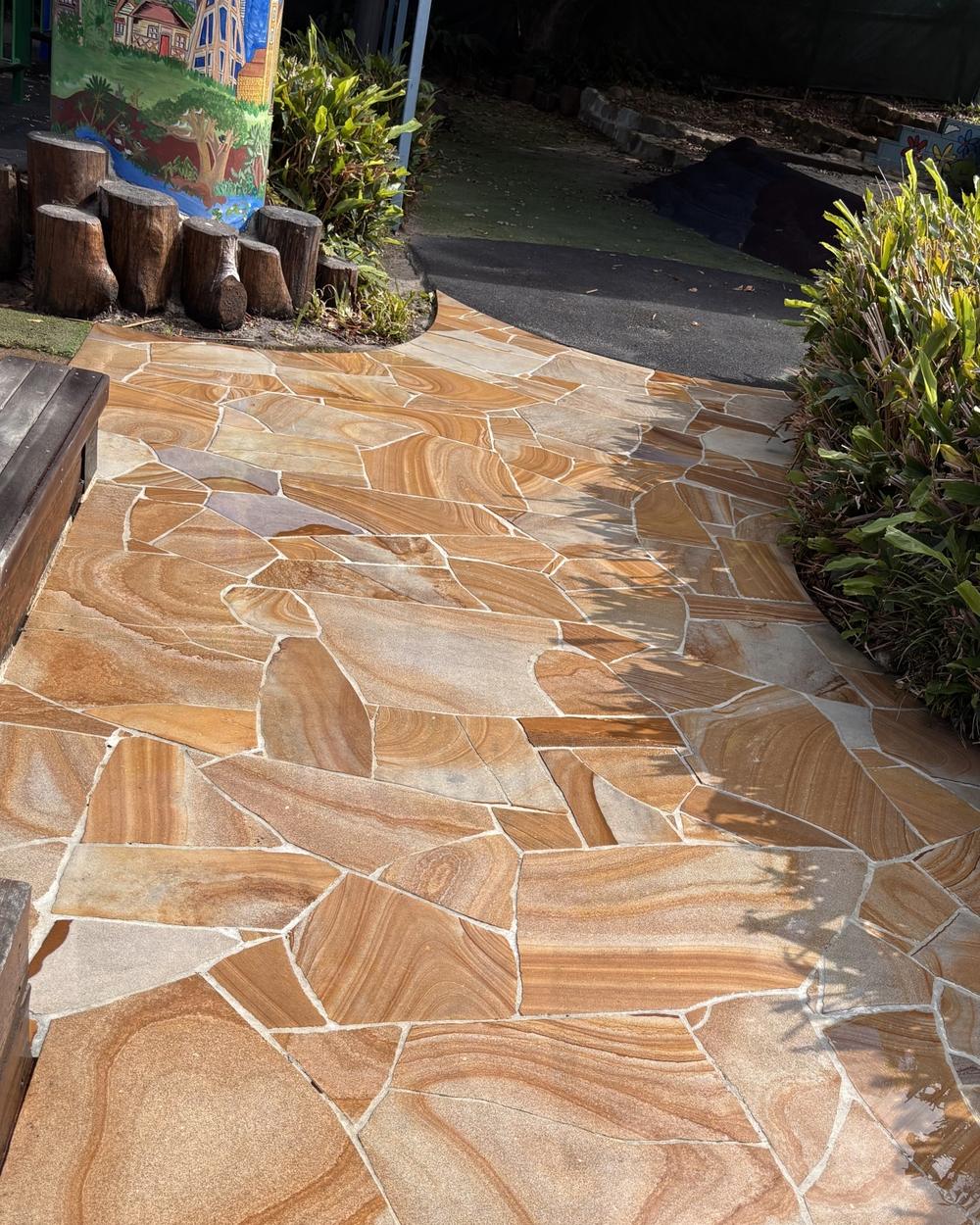 The same sandstone path after pressure washing