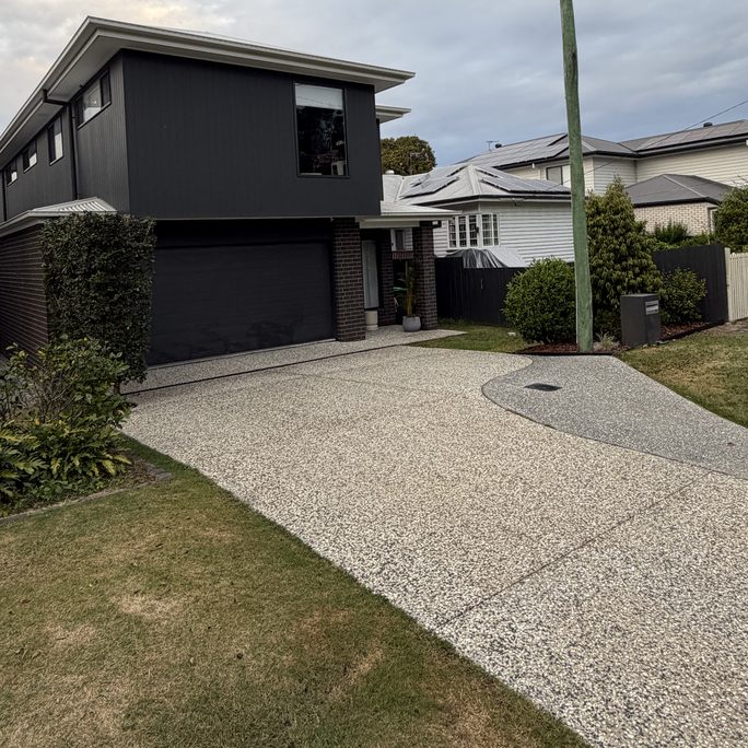 Freshly cleaned exposed aggregate driveway